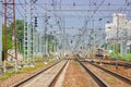 Perspective view on empty railway tracks for high speed trains and suburban trains and electric infrastructure equipment, devices.