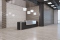 Perspective view on empty stylish dark and metallic reception desk in modern interior design business center office hall with