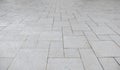 Perspective view of Grunge White Square Brick Stone on The Ground for Street Road. Sidewalk, Driveway, Pavers Royalty Free Stock Photo