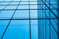 Perspective view of modern futuristic glass building abstract background. Exterior of office glass building architecture. Royalty Free Stock Photo