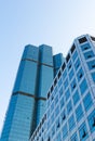 Perspective view of modern glass building blue sky Royalty Free Stock Photo