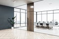 Perspective view of modern office hallway with boardroom with glass wall, panoramic window, wooden floor and entrance door. 3D Royalty Free Stock Photo