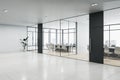 Perspective view of office hallway with several meeting rooms with glass wall, panoramic window, wooden floor and entrance