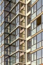 Perspective view of part facade of new building with glazed balconies Royalty Free Stock Photo