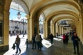 Perspective view of picturesque ancient arcades of city downtown Turin Italy