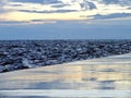 Perspective view from the pier to the sea with a beautiful evening sky. Royalty Free Stock Photo