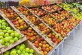 Perspective view of a pile of apples in the cartons boxes