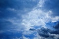 Perspective view of romantic navy blue sky with white grey clouds. Before the rain. High resolution artistic skyline background im Royalty Free Stock Photo