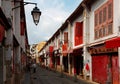 Perspective view of the Street of Happiness Rua da Felicidade flanked by traditional Chinese houses