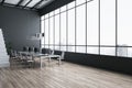 Perspective view on stylish minimalistic interior design open space office with modern computers on light table on city view Royalty Free Stock Photo