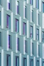 Perspective view to facade of modern corporate building with reflections in windows Royalty Free Stock Photo