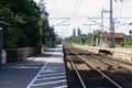 Perspective view of train tracks and platform at train station of Elmshorn, Germany Royalty Free Stock Photo