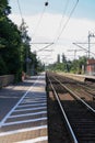 Perspective view of train tracks and platform at train station of Elmshorn, Germany Royalty Free Stock Photo
