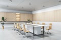 Perspective view on white conference table and stylish chairs around on concrete floor in spacious meeting area with light wall