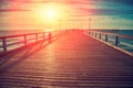 Sunset over the sea. wooden pier Royalty Free Stock Photo