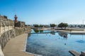 Perspective of the wall of the Santa Catarina fort with a small lake and birds in Figueira da Foz, PORTUGAL Royalty Free Stock Photo