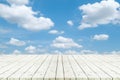 Perspective white wooden table on top over blur Blue sky and cloud background, Empty table for Your photo, Great for summer Royalty Free Stock Photo