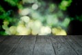 Perspective wood and blurred nature with bokeh light background. Royalty Free Stock Photo