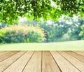 Perspective wood over blur trees with bokeh background Royalty Free Stock Photo