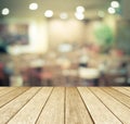 Perspective wood over blurred restaurant with bokeh background Royalty Free Stock Photo