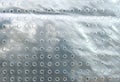 Perspex sheet with holes. Royalty Free Stock Photo