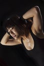 Perspiring Asian girl working out Royalty Free Stock Photo