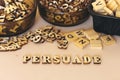 Persuade text with small wooden letters