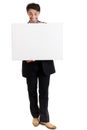 Persuasive man with a big smile and a blank sign Royalty Free Stock Photo