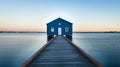 Perth blue boathouse. Deep blue with a wooden bridge