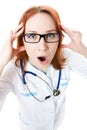 Perturbed funny young female doctor Royalty Free Stock Photo