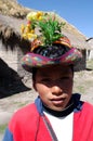 Peru Ayacucho, poor children in school studying in the mountains with row and teacher typical clothing in the Andes