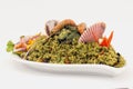 Peru Dish: Seafood green rice made of rice, coriander, seafood, onion, shrimp.