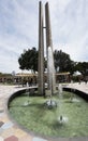 Peru Ica Plaza de Armas with its pyramid sculpture and its water fountain and garden with flowers Royalty Free Stock Photo