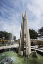 Peru Ica Plaza de Armas with its pyramid sculpture and its water fountain and garden with flowers Royalty Free Stock Photo