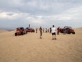 People and buggies at the desert Royalty Free Stock Photo