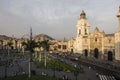 Peru Lima Plaza de Armas Matropolitan Cathedral with its bell tower Garden with flowers