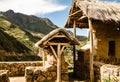 Peru, May, near Pisac, hillside farm buildings, thatched, outbuildings