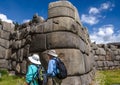 Peru, May, Saksaywaman, Inca military fortress near Cusco, backpackers couple foreground