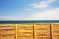 Peru bamboo fence without people with blue sky and sea peaceful rural scene