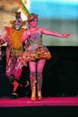 Peru woman dancing with her typical colorful clothes during a musical show at La Vigen de la Candelaria carnival