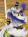 Puno woman dancing with her typical colorful clothes during a musical show at La Vigen de la Candelaria carnival