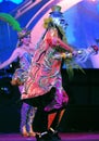 Puno woman dancing with her typical colorful clothes during a musical show at La Virgen de la Candelaria carnival