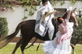 Peru traditional paso horses with chalan with their typical clothes on a hacienda dancing with a woman dressed as a marinera