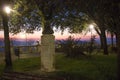 Statue dedicated to Pintoricchio at Perugia Piazza Italia`s garden at sunset time
