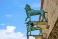 Perugia, Italy - Symbolic Lion and Griffin decorations of the medieval Palazzo dei Priori city hall building at the Piazza IV