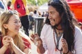 Peruvian artist selling his handmade jewelry at latino market in center of Prague