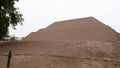 Peruvian construction in the shape of a truncated pyramid located in the middle of the residential area, Huaca Pucllana.