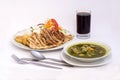 Peruvian Dish:Chicken soup of coriander,aguadito de pollo)+chicha morada (purple corn juice) and chicken grilled.