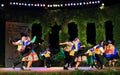 Peruvian folklore group dancing in pairs on stage Royalty Free Stock Photo