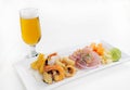 Peruvian food: chicharrones de pescado with ceviche cebiche .